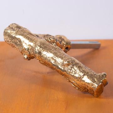 Poignée de porte Branche en métal patiné, or [1]