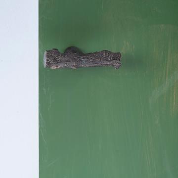 Poignée crémone Branche en métal patiné