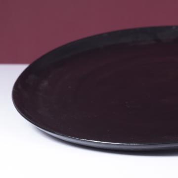 Crato Plates in turned earthenware, black, 29 cm diam. [2]