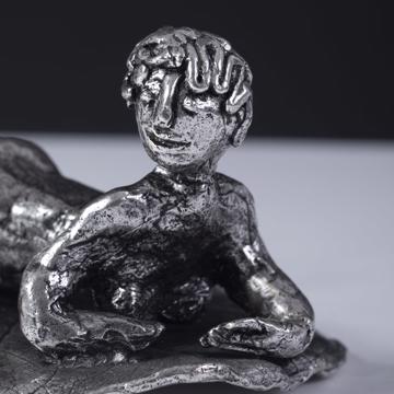 Silver plated bathers, silver, on her belly [2]