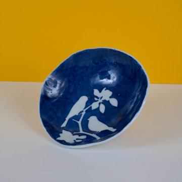 Stencil cup in stamped porcelain , dark blue, bird [1]