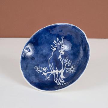 Stencil cup in stamped porcelain , dark blue, parrot [1]