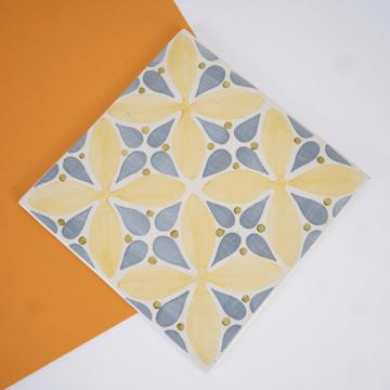 Geometric earthenware trivet, yellow